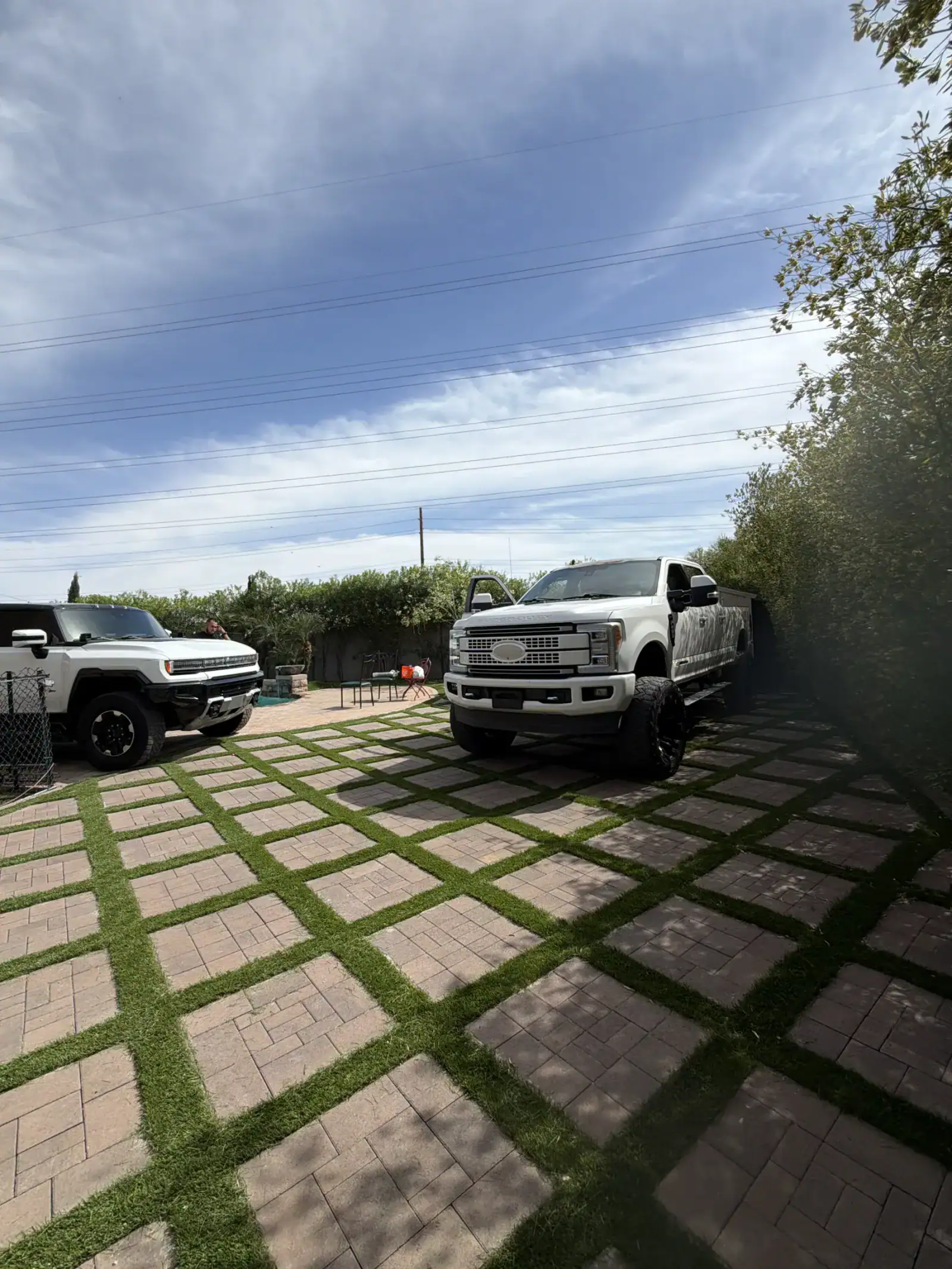 Finished paver and turf layout in a Phoenix-area backyard